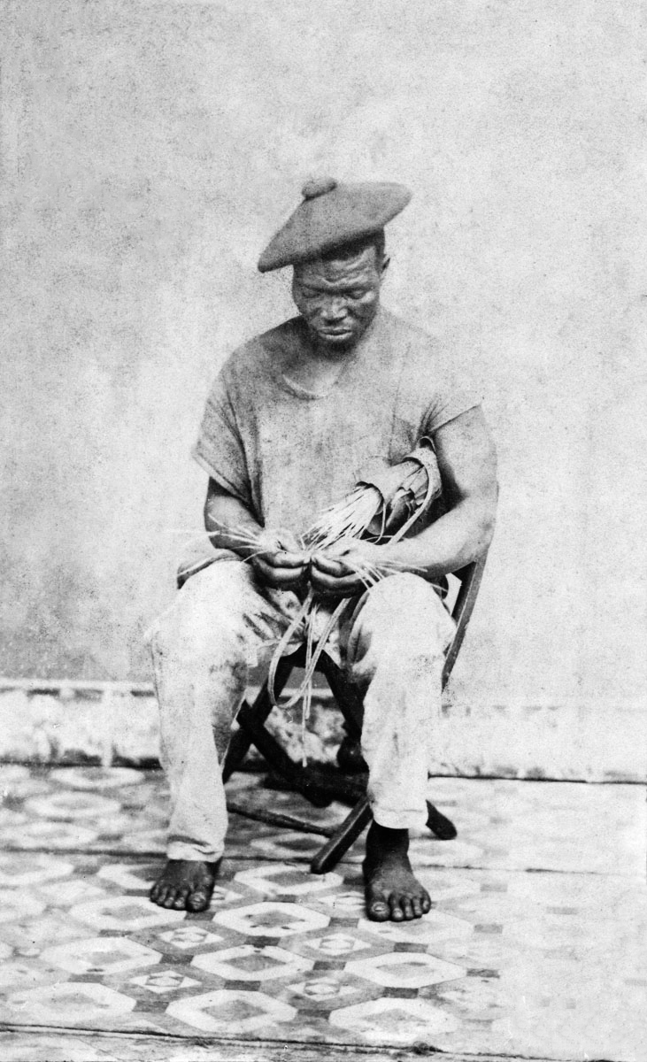Slave posing in studio, c. 1870